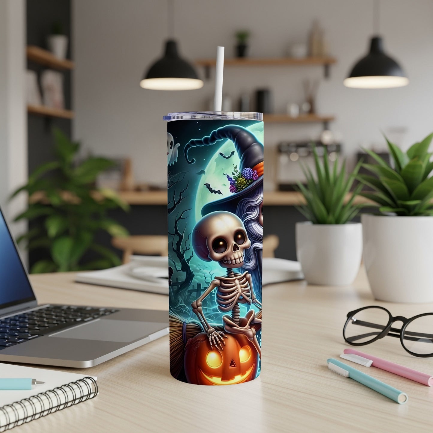 Halloween tumbler with skeleton, witch, ghost, bats, and pumpkin design.