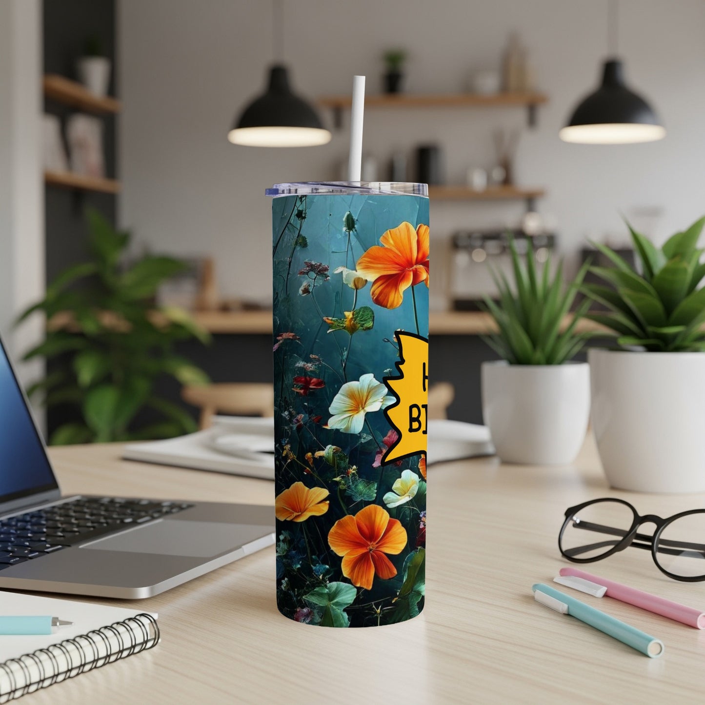 Tall tumbler with colorful floral design and "Happy Birthday" text.