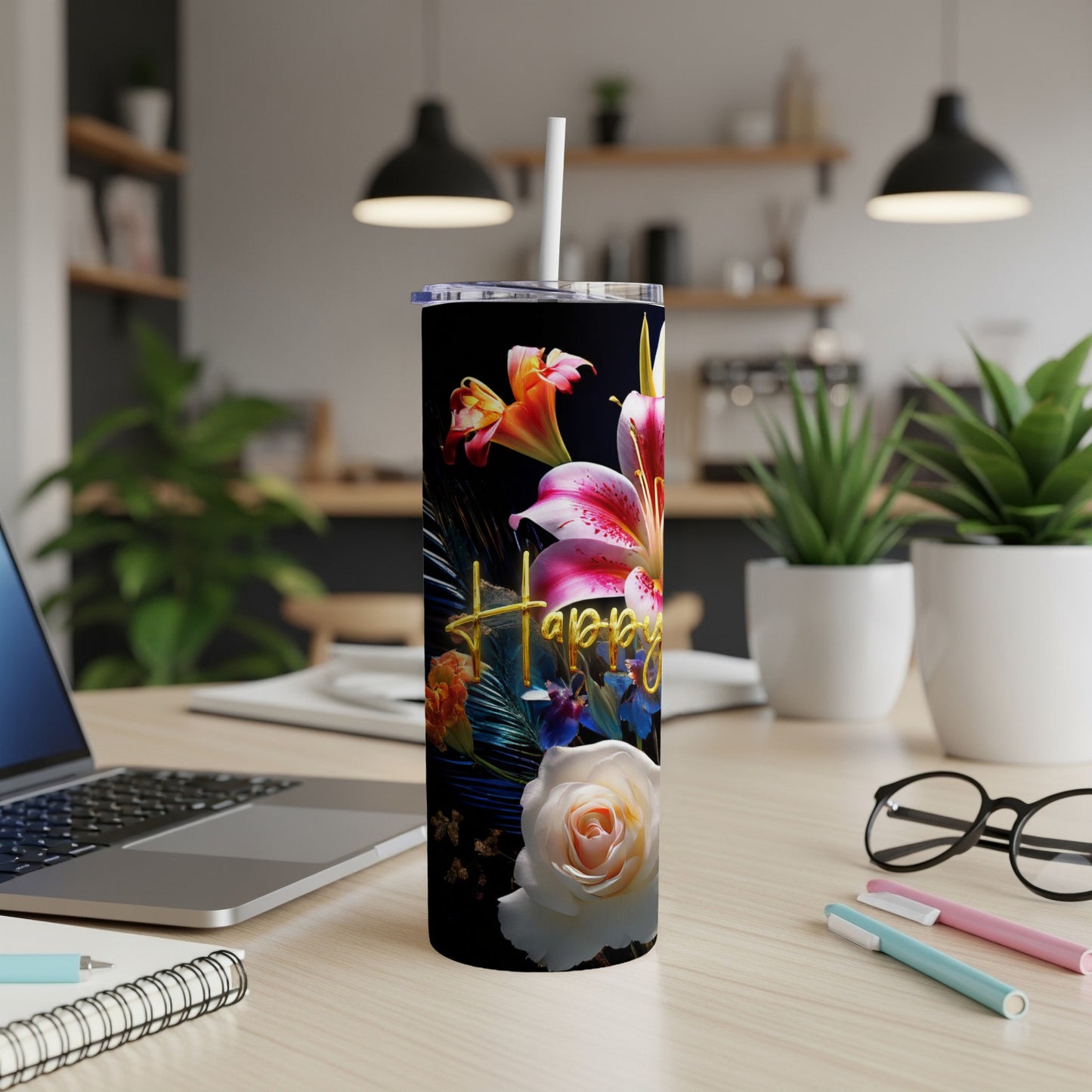 Black tumbler with floral design and "Happy" text.