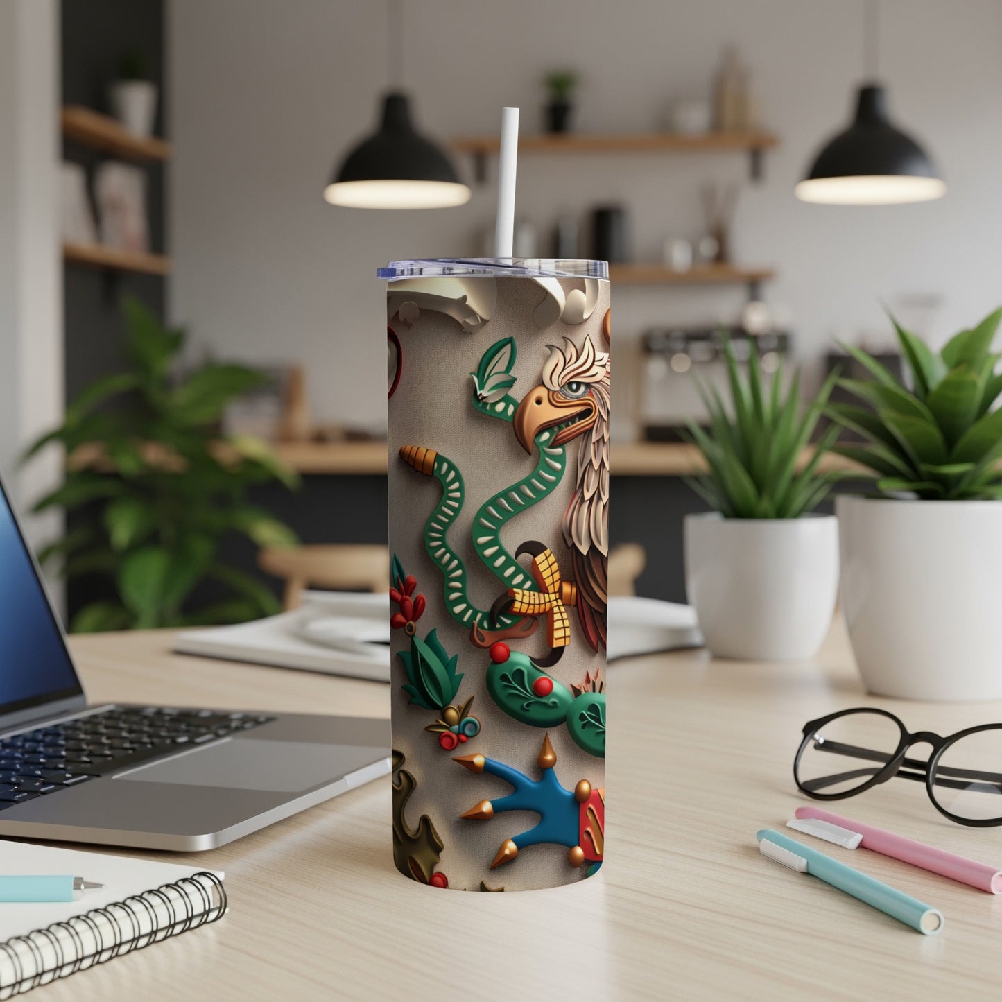 Dragon and eagle design on a tan tumbler with a white straw.