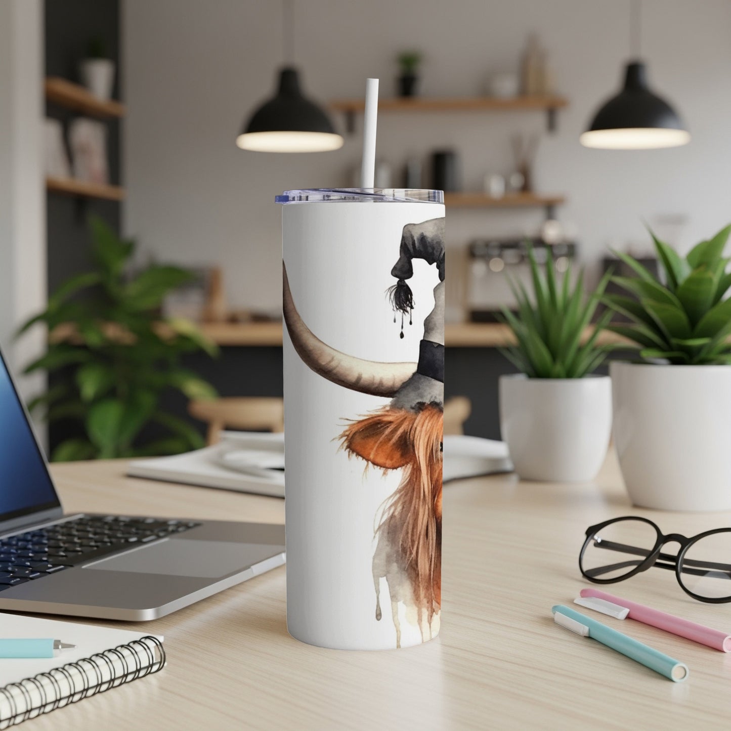 Tumbler featuring watercolor Highland cow wearing a witch hat.