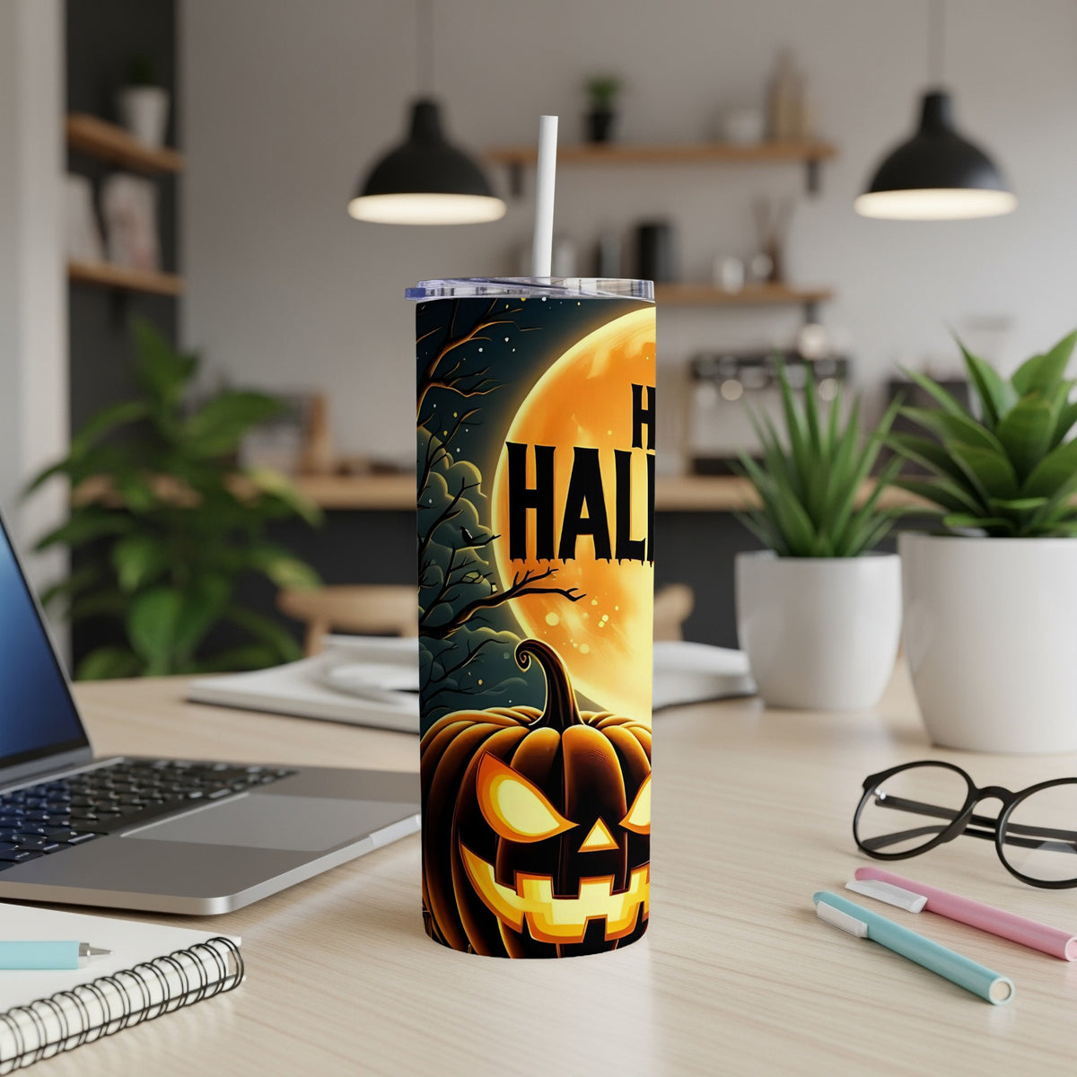 Halloween tumbler with jack-o'-lantern and full moon design.