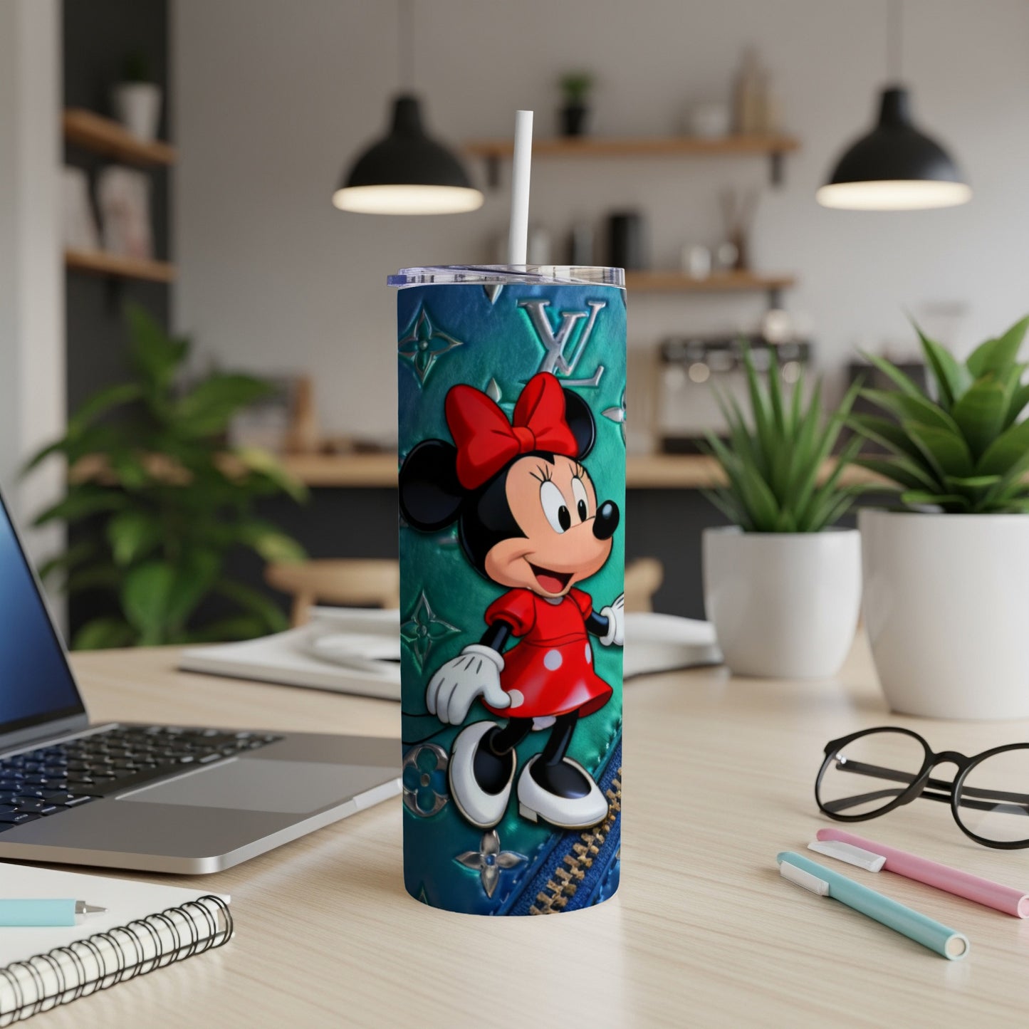 Minnie Mouse on a teal tumbler with faux leather and zipper texture.