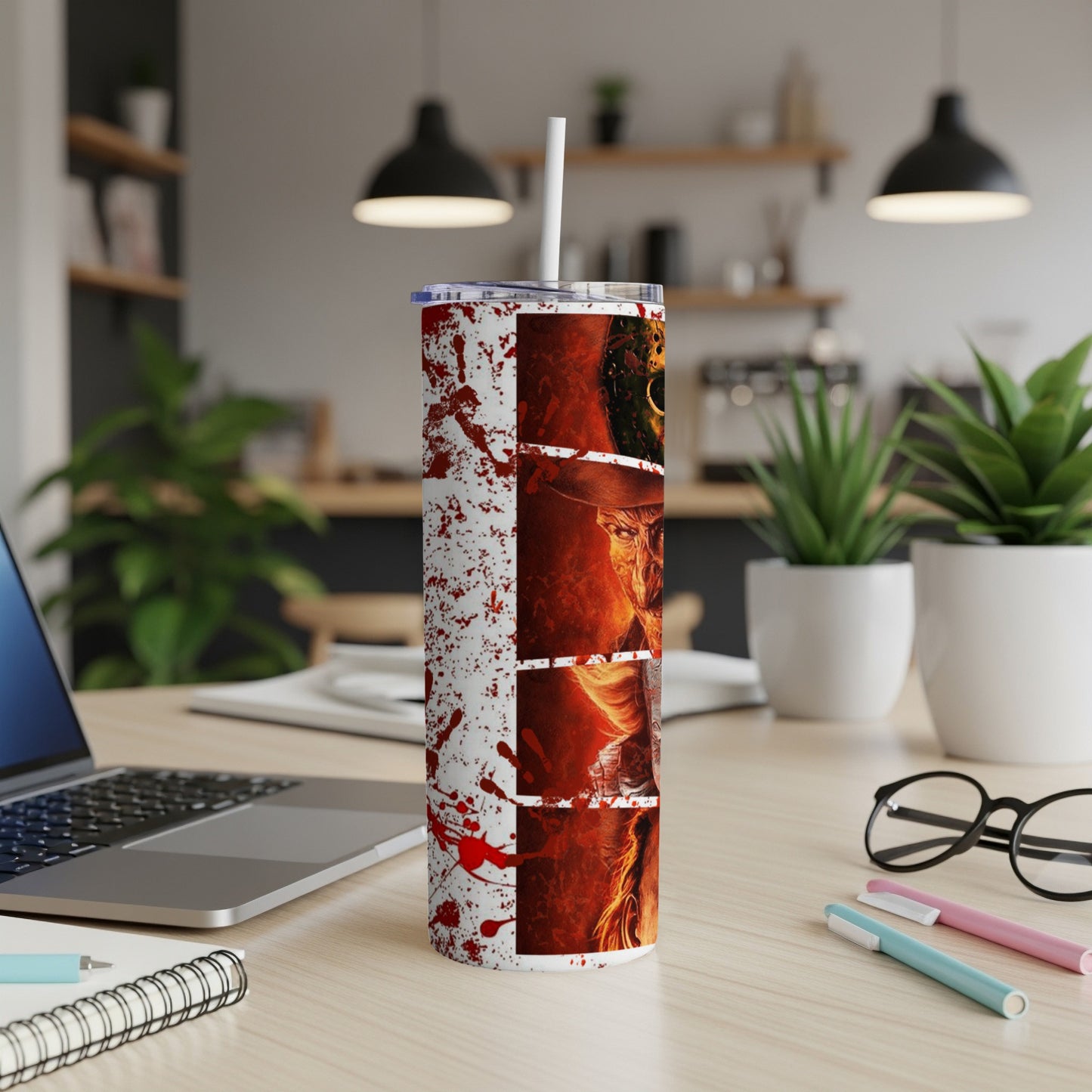 Tumbler with horror movie characters and blood splatter design