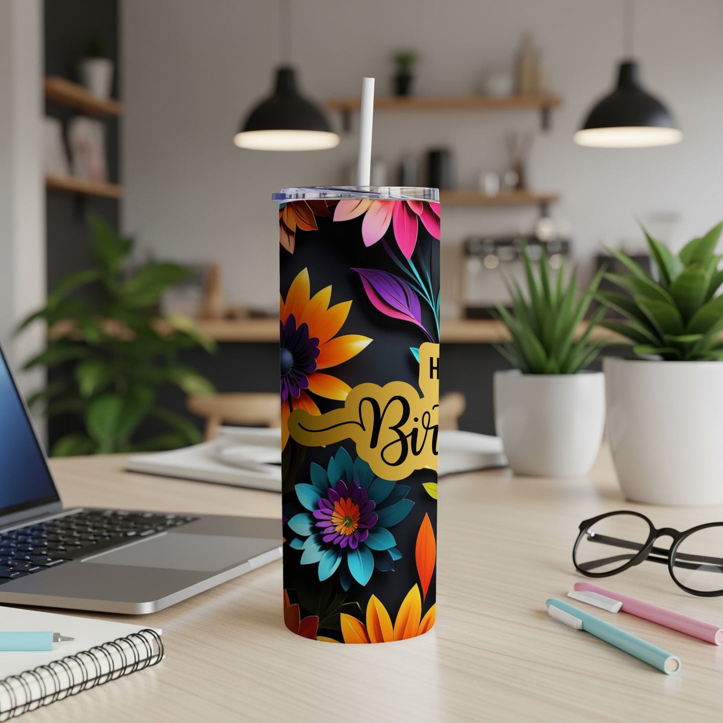 Tall black tumbler with colorful floral design and "Happy Birthday" text.