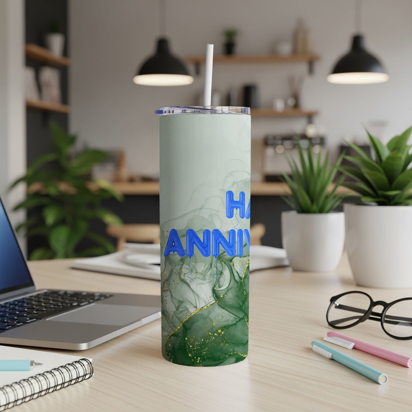 Green and blue marble tumbler with "Happy Anniversary" text.
