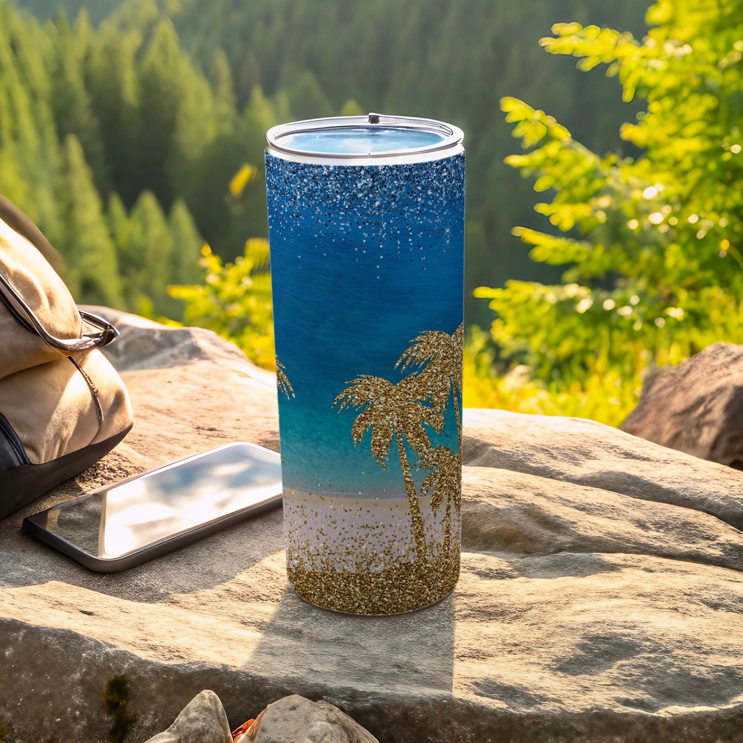 Glittery palm tree tumbler with beach and ocean scene.