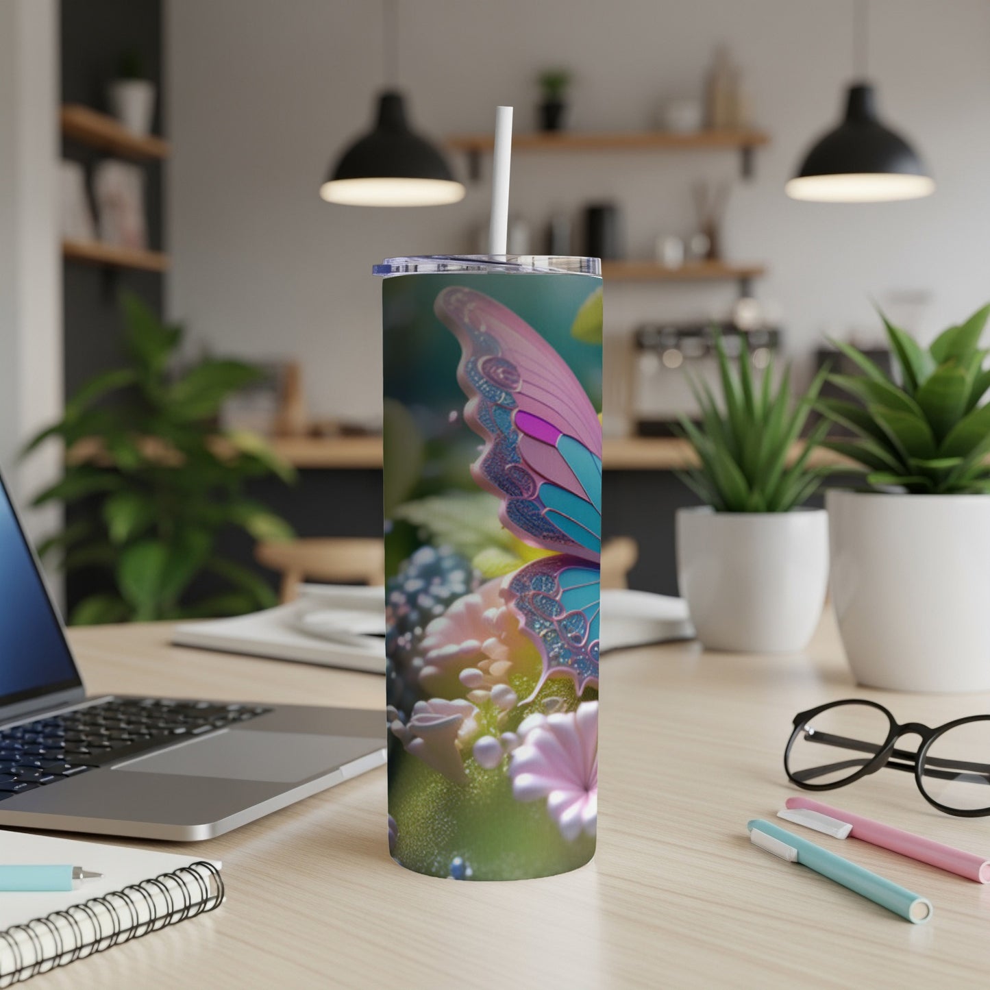 Tall tumbler with butterfly design and floral accents.
