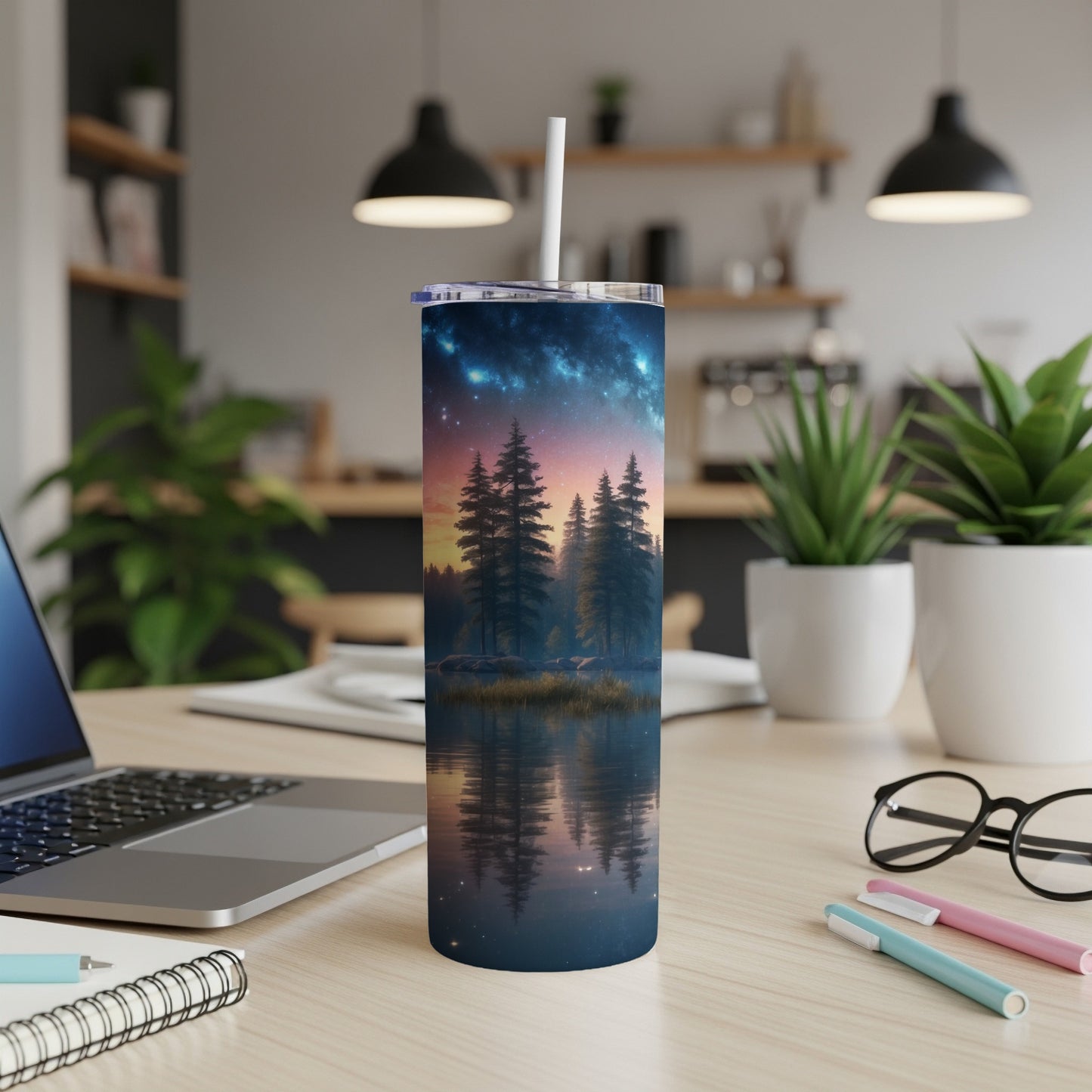 Tall tumbler with nighttime forest and starry sky reflection scene.