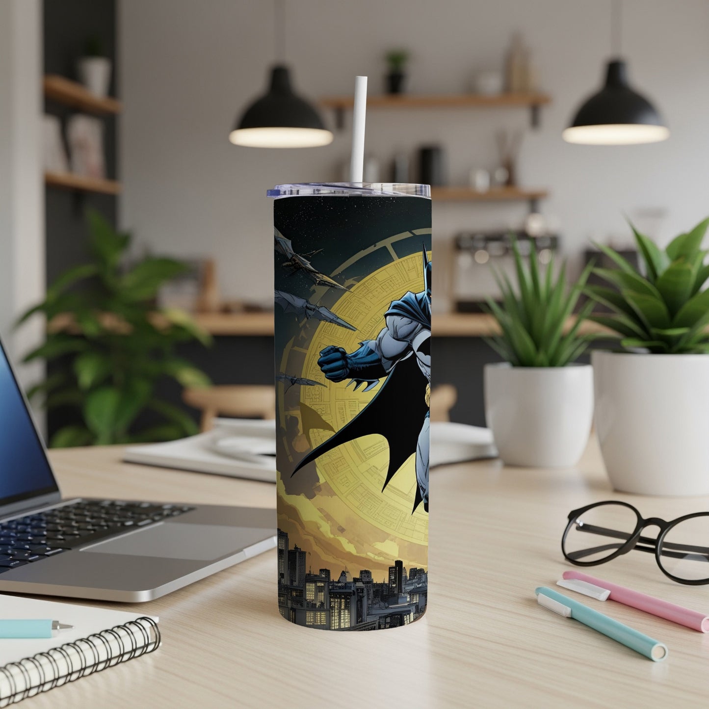 Batman in flight over a city skyline, on a cylindrical tumbler.