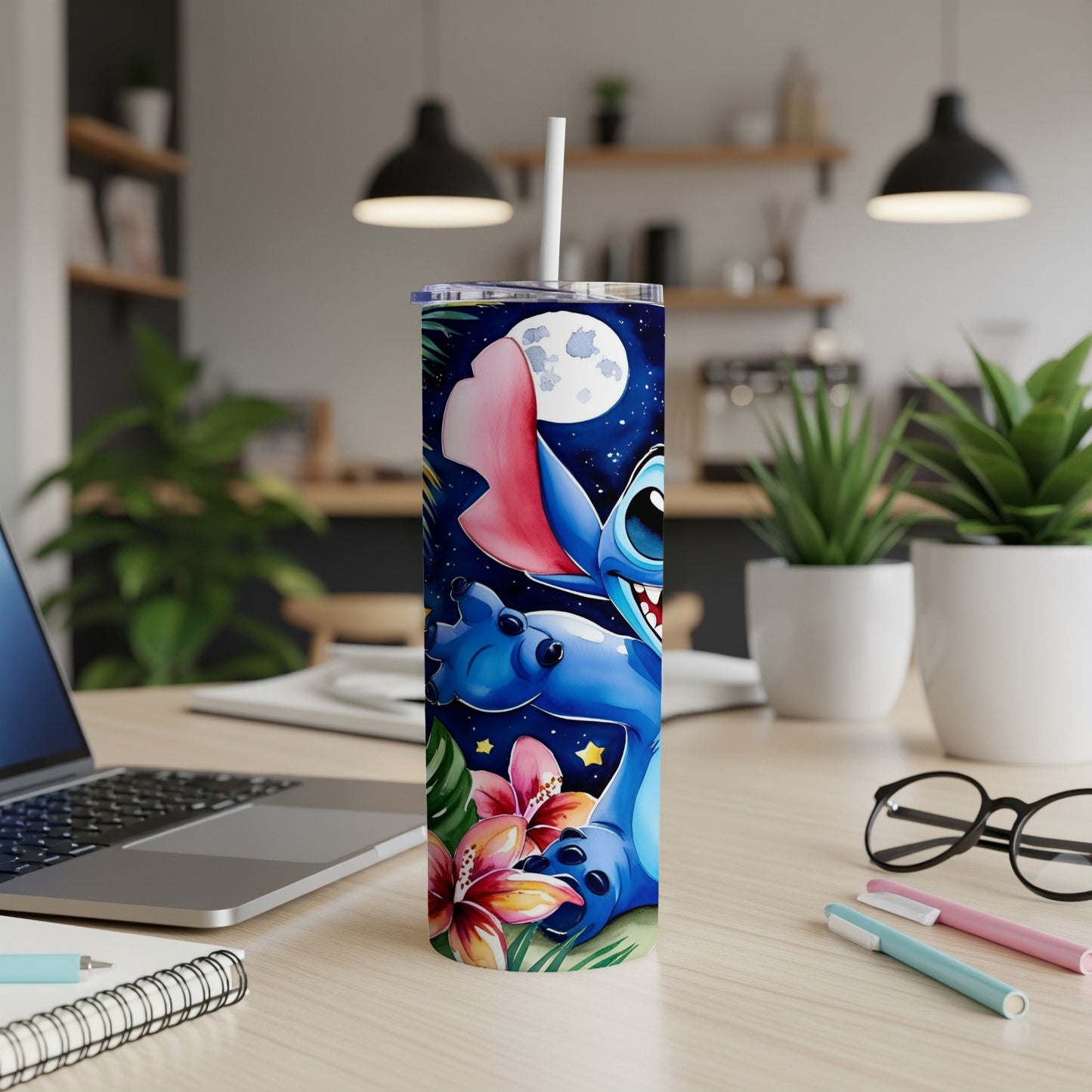 Stitch character design on a white tumbler with floral accents.
