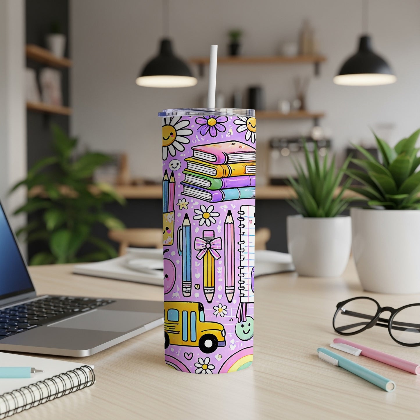 Tumbler with lavender background featuring a doodle pattern of school bus, books, pencils, and flowers.