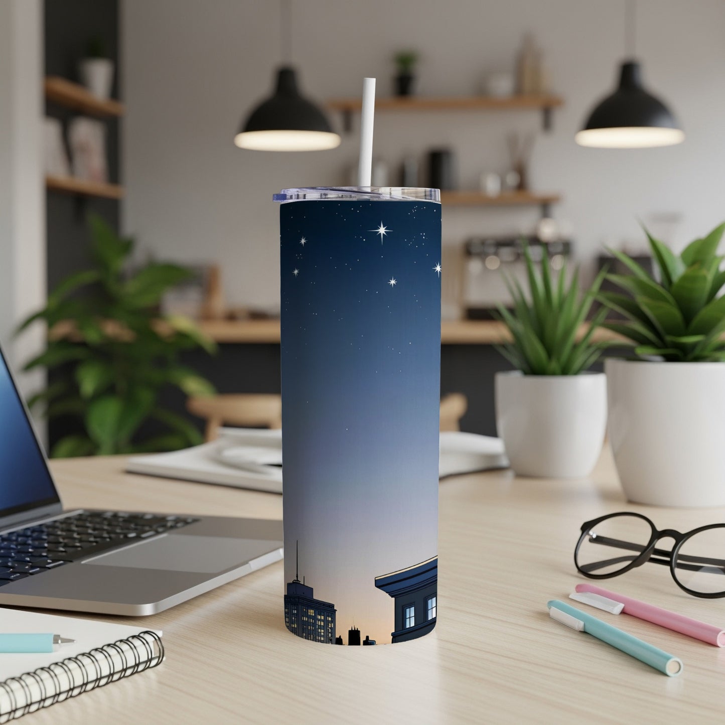 Tall tumbler with a night sky and city silhouette design.