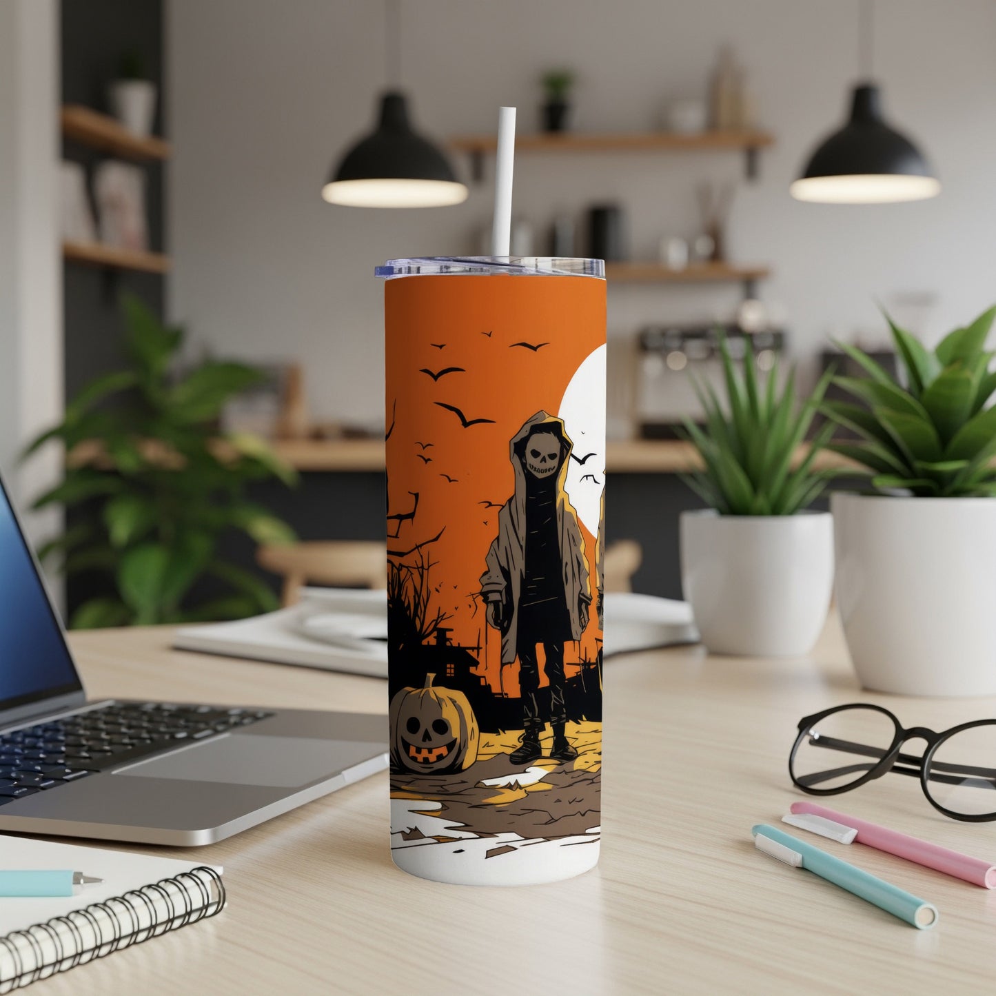 Tumbler with Halloween scene: skeleton, pumpkin, and spooky trees under a full moon.