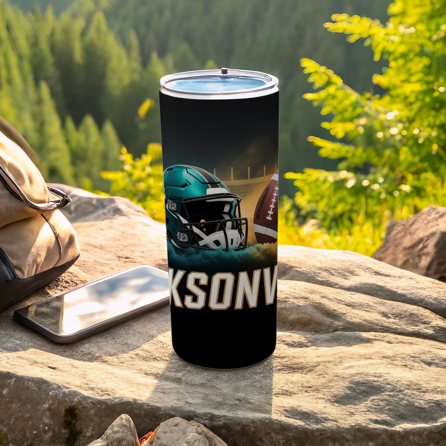 Black tumbler with Jacksonville Jaguars helmet and football design.