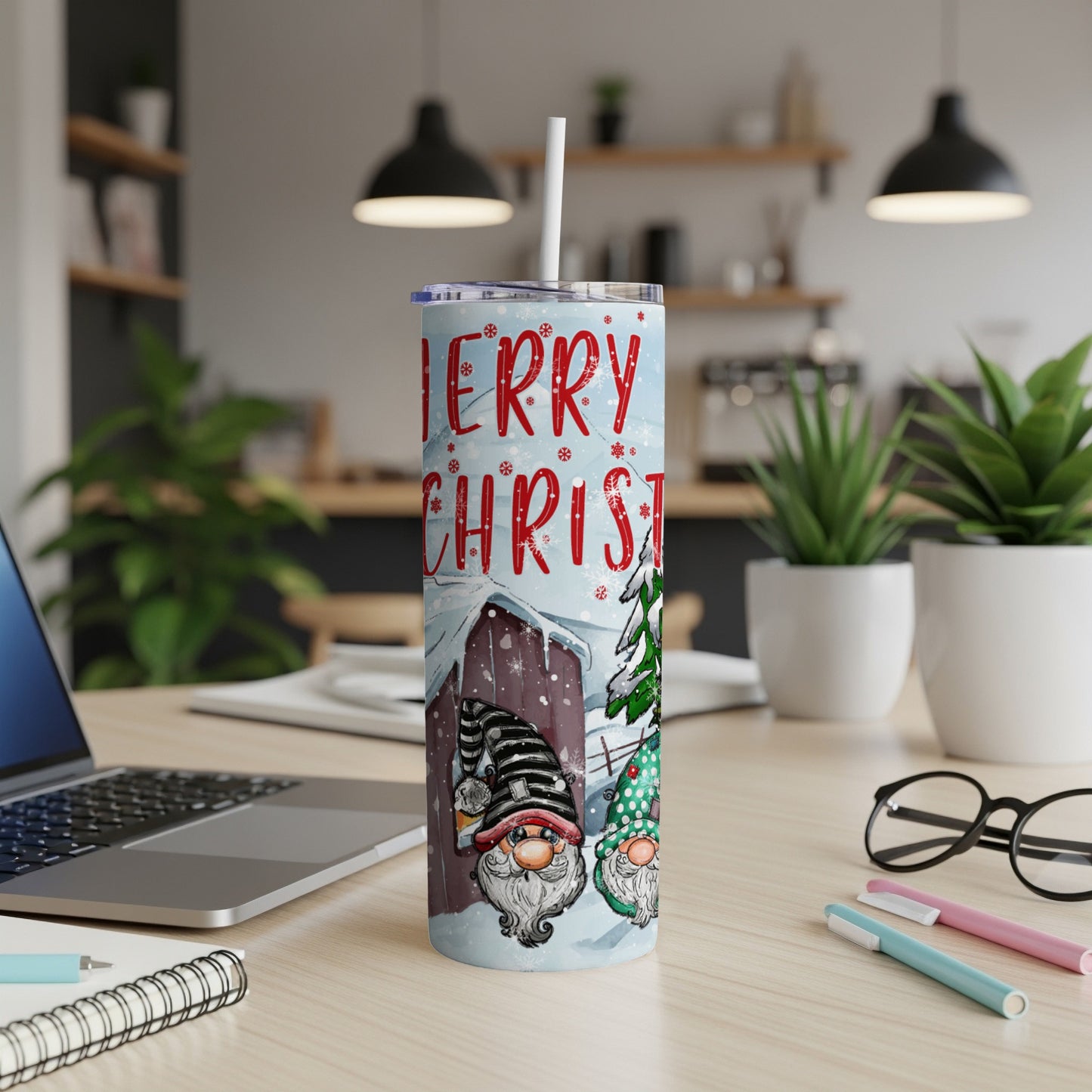 Christmas tumbler with gnomes and snowflakes, reading "Merry Christmas."