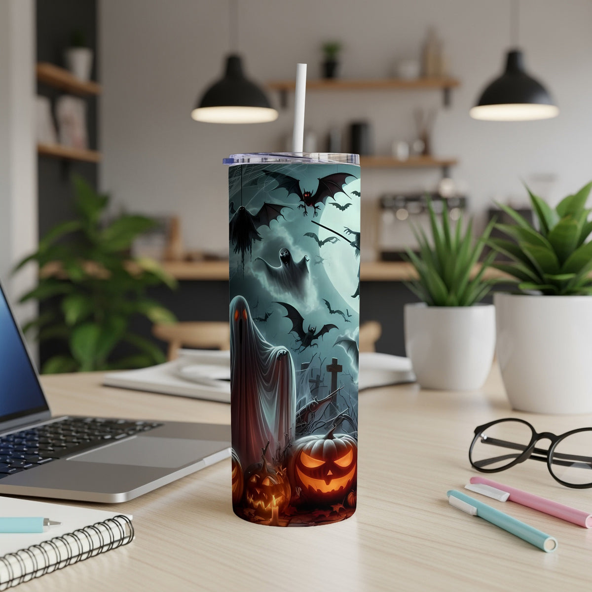 Halloween tumbler with ghosts, bats, pumpkins, and a graveyard scene.