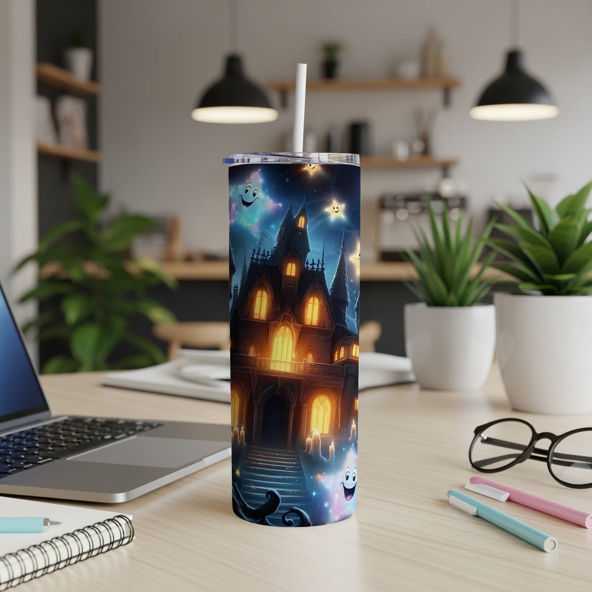 Tall tumbler with a spooky haunted house and friendly ghosts illustration.
