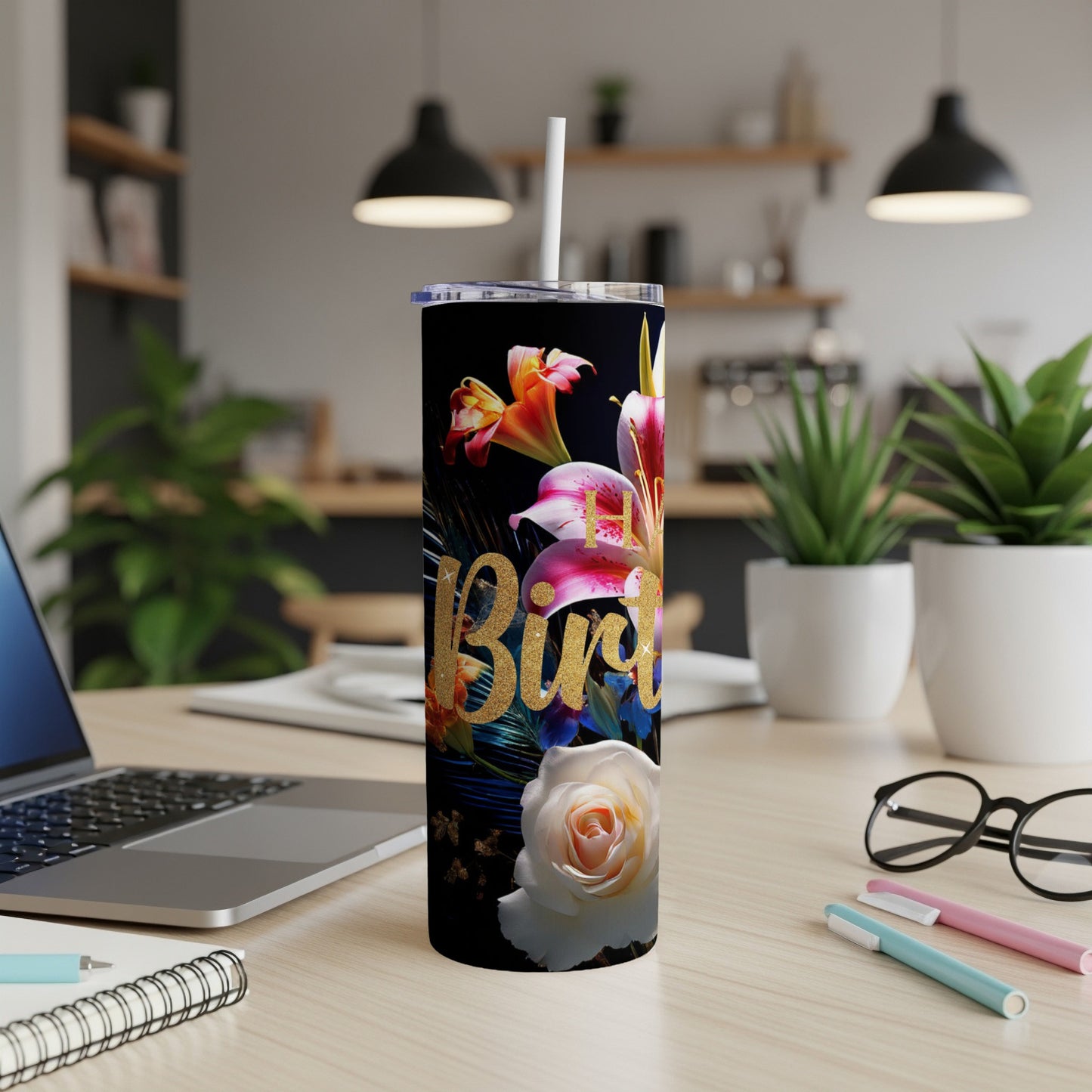 Black tumbler with floral and "Birthday" text design.