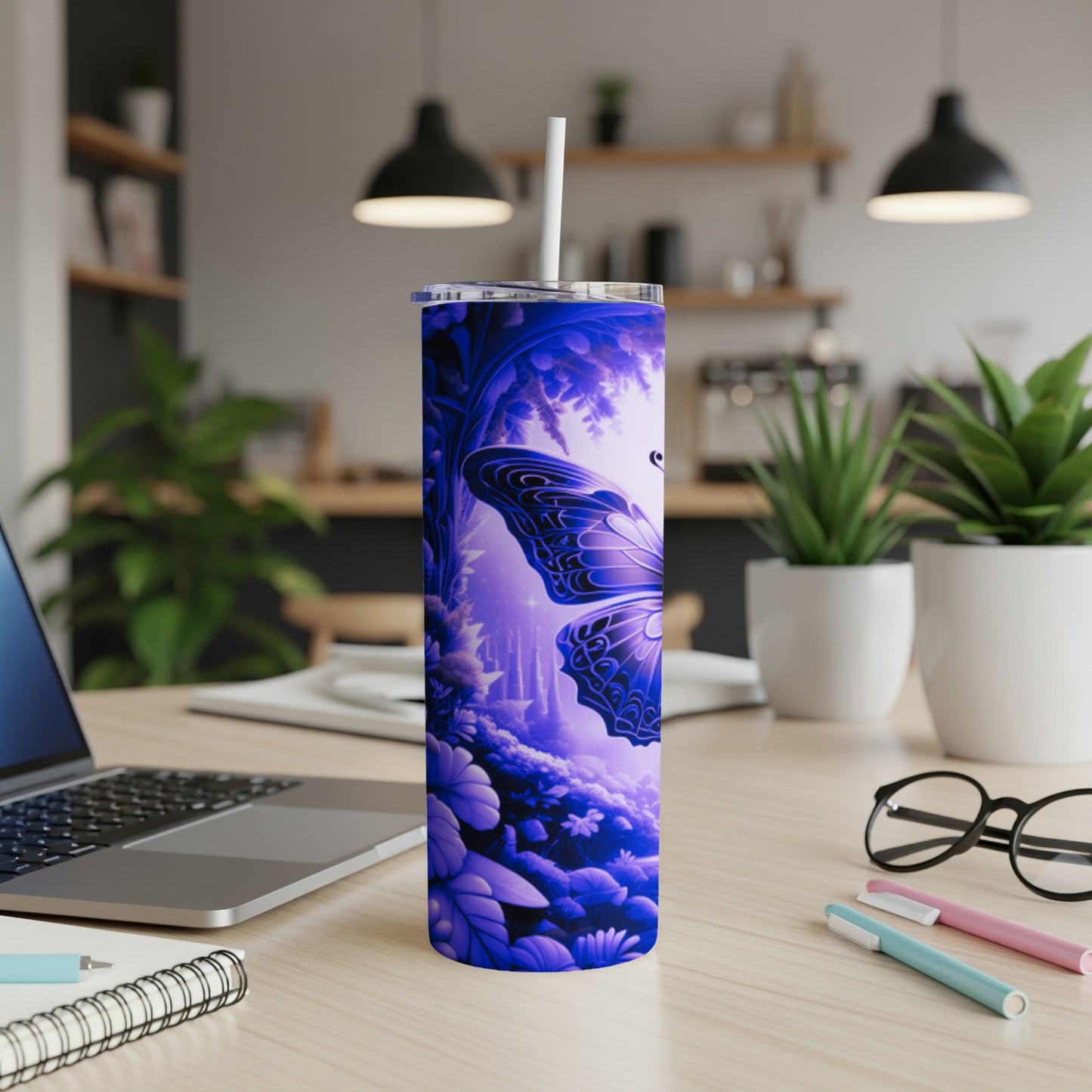 Purple butterfly on a blue gradient tumbler with flowers and foliage.