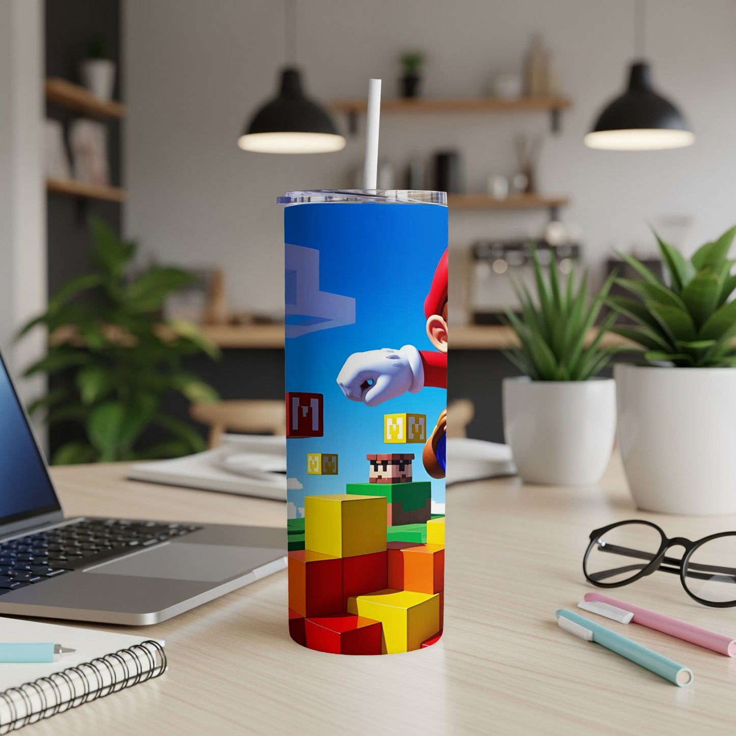 Mario leaping over colorful blocks from Super Mario Bros. on a blue tumbler.