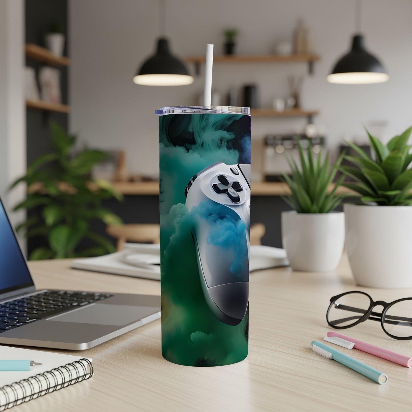 Tumbler with gaming controller and swirling green and blue smoke design.
