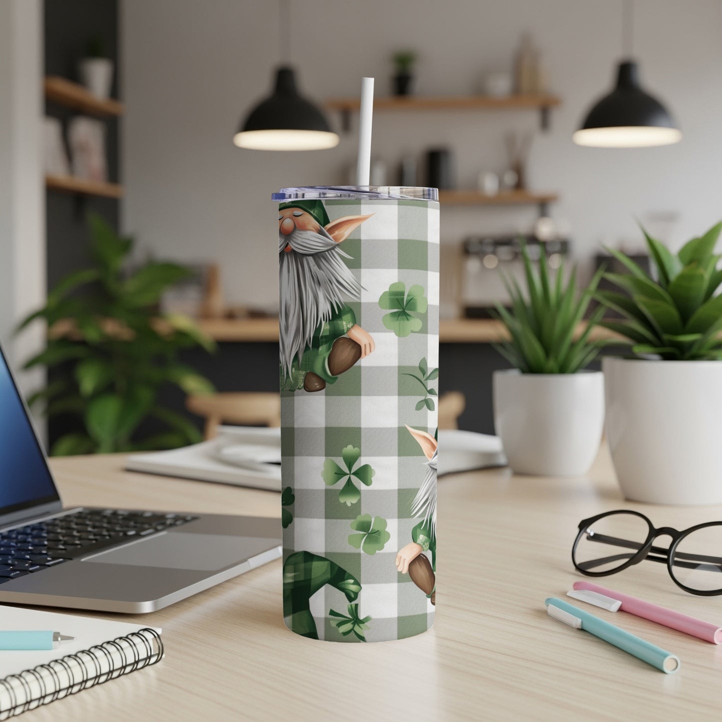 Gnome and shamrocks patterned tumbler with a white straw.