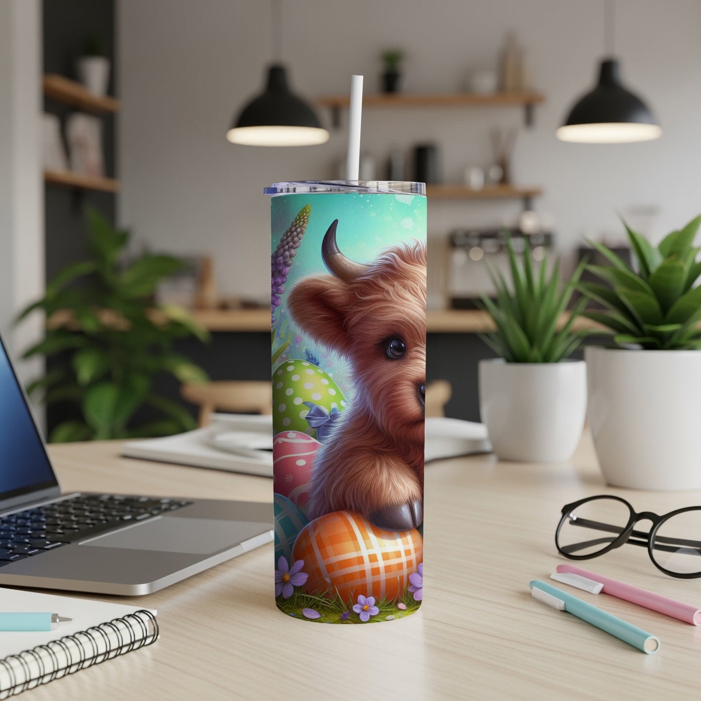 Highland cow and Easter eggs on a tumbler with a straw.