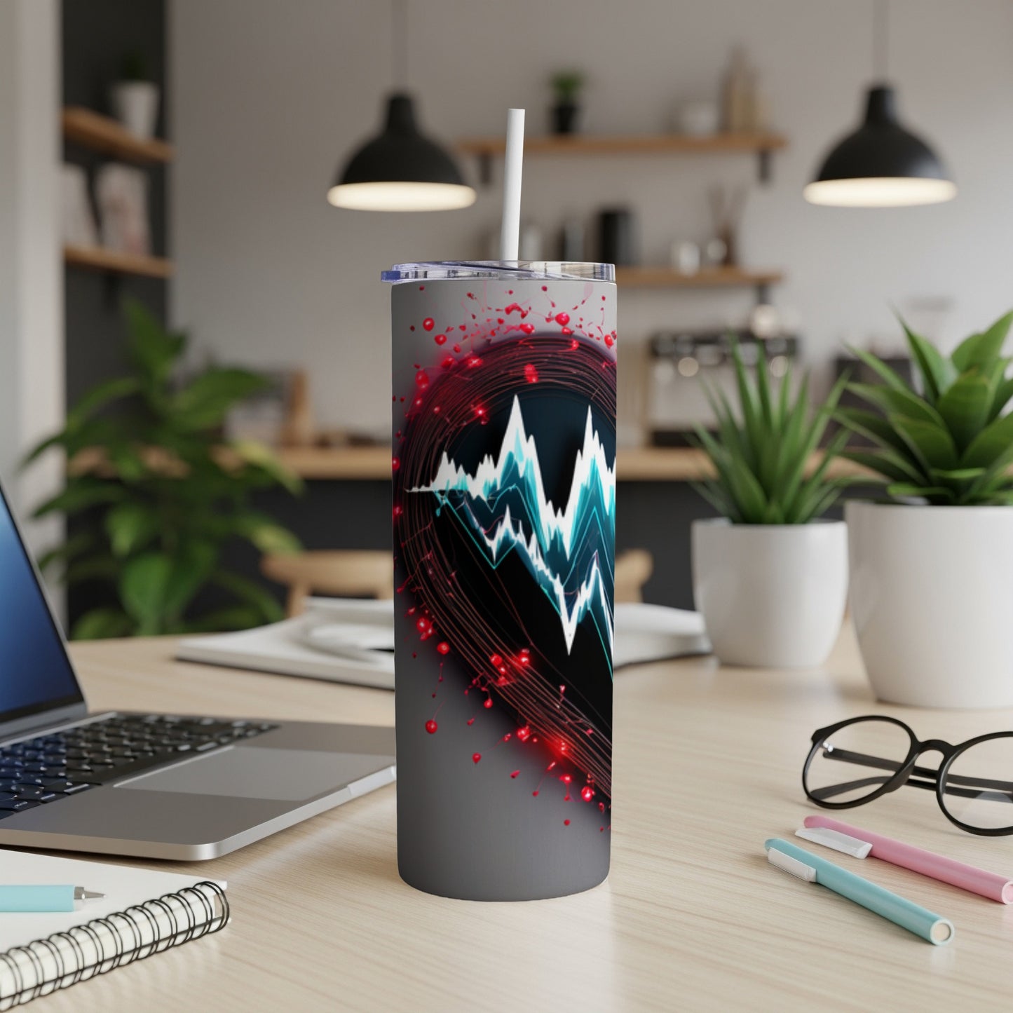 Gray tumbler with abstract blue and red waveform design.