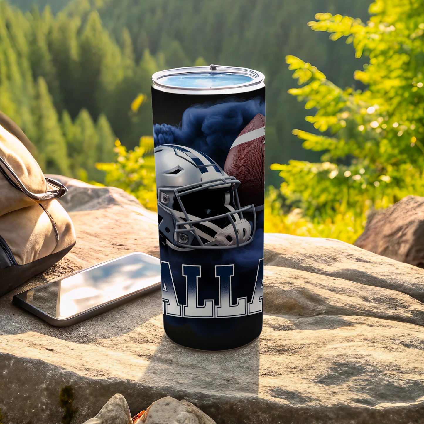 Dallas Cowboys football helmet and ball on a tumbler.