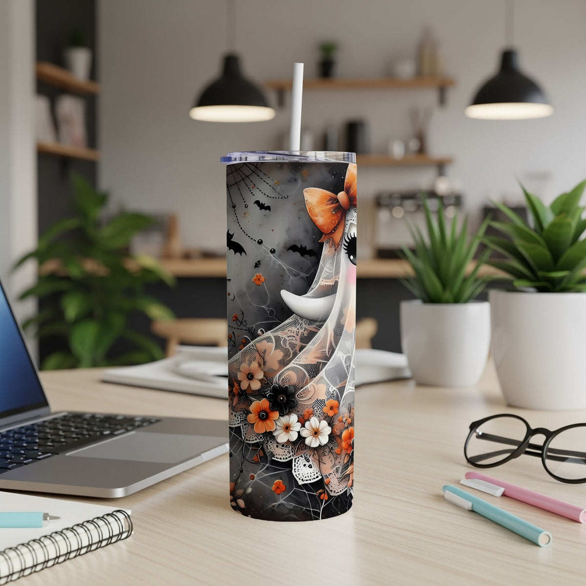 Halloween tumbler with ghost, bats, spiders, and floral design.