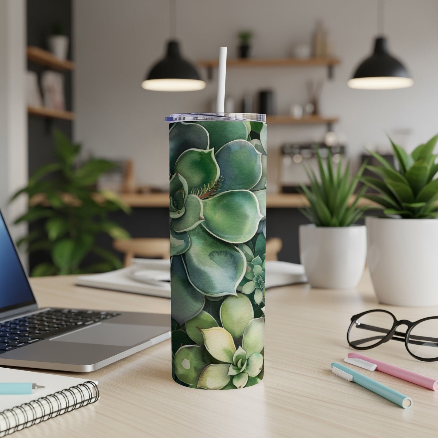 Tall tumbler with a watercolor succulent plant pattern.