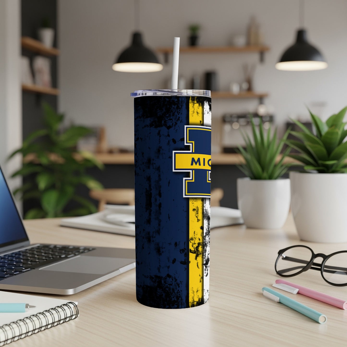 Michigan Wolverines tumbler with a distressed navy, yellow, and white design.