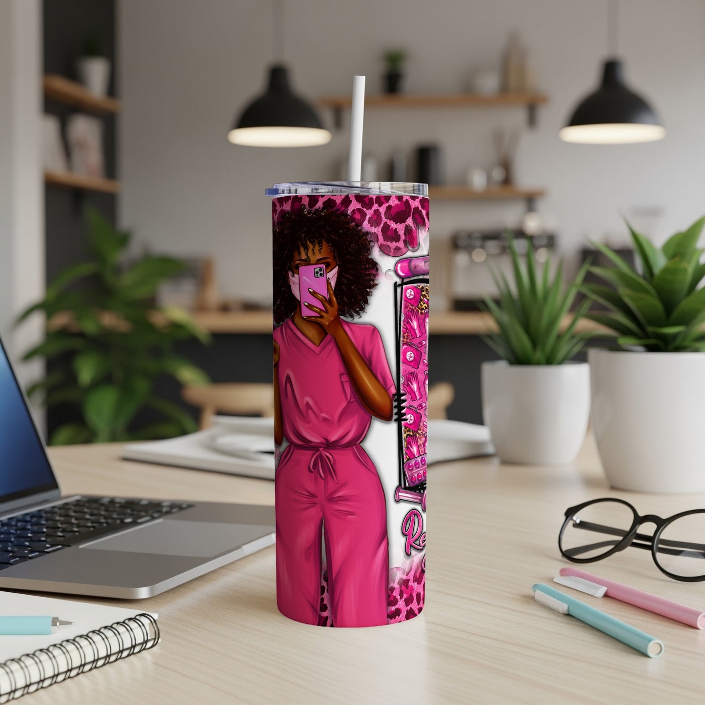 Nurse with pink scrubs and leopard print, holding phone.