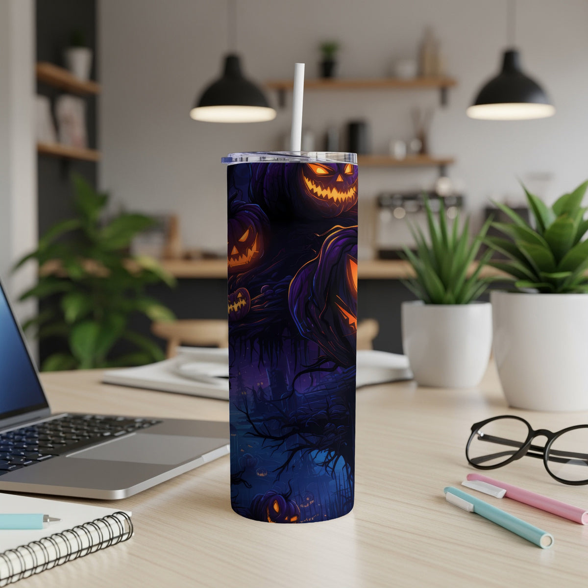 Tumbler with a spooky Halloween jack-o'-lantern design on a dark, misty background.