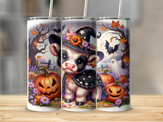 Cow in witch hat and cape with Halloween pumpkins and ghost.