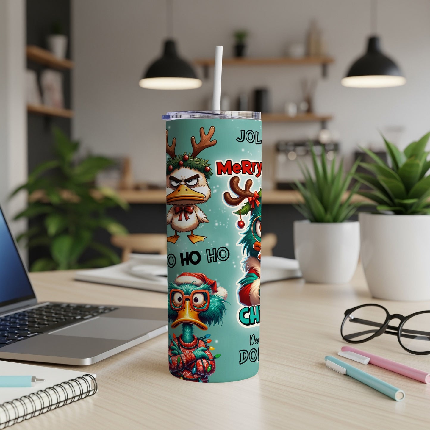 Christmas tumbler with cartoon ducks and "Jol-ly Ho Ho Merry Christmas" text.