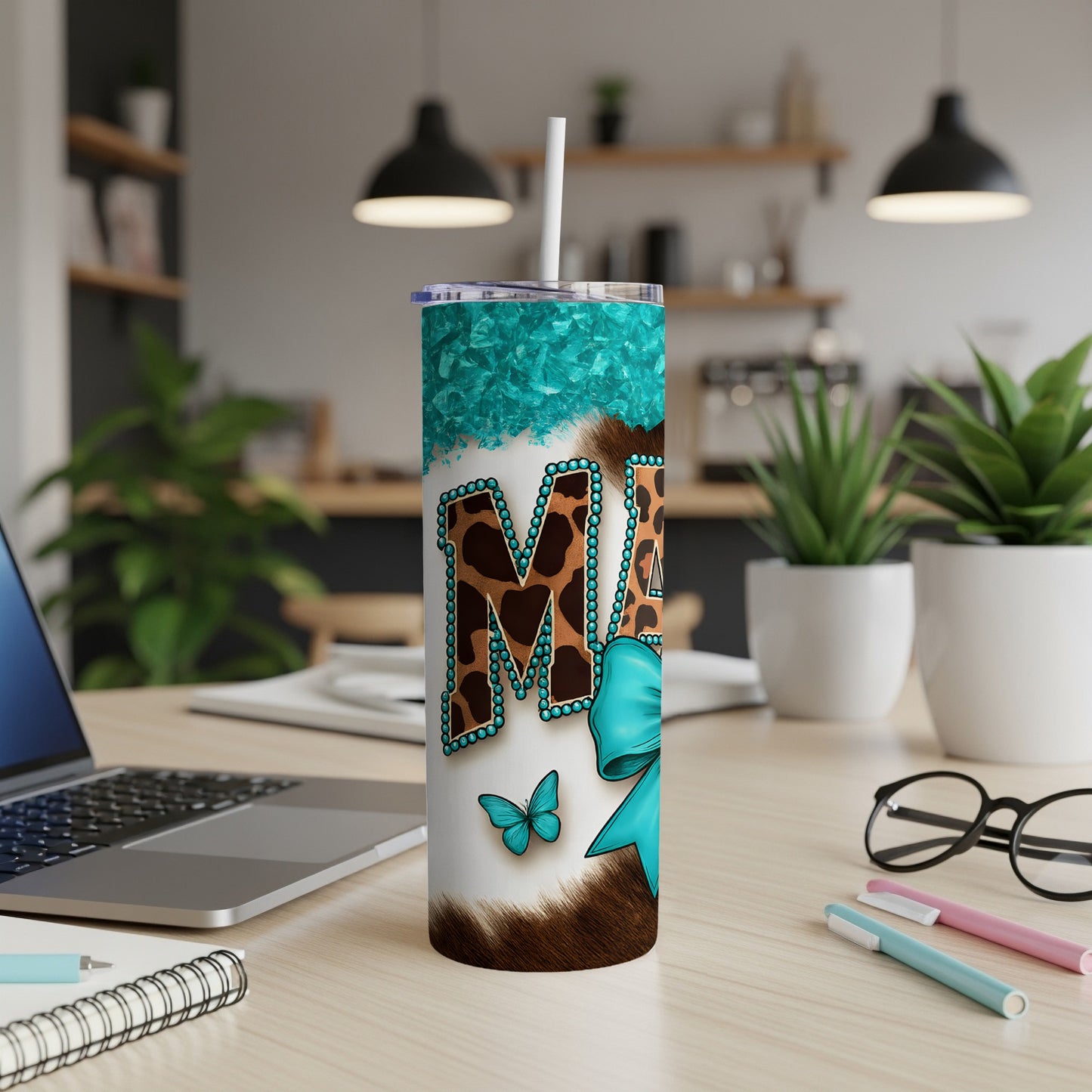 Turquoise and leopard print "Mama" tumbler with blue bow and butterfly accent.