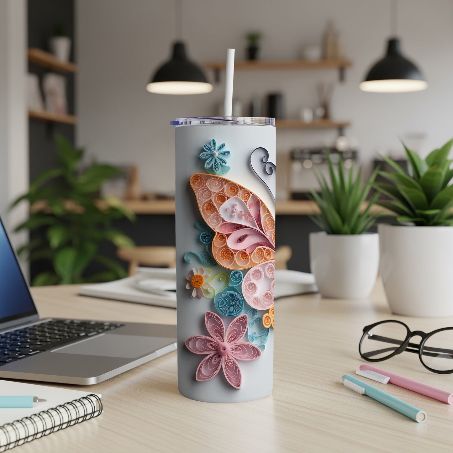 Tumbler with quilled butterfly and floral designs, straw included.