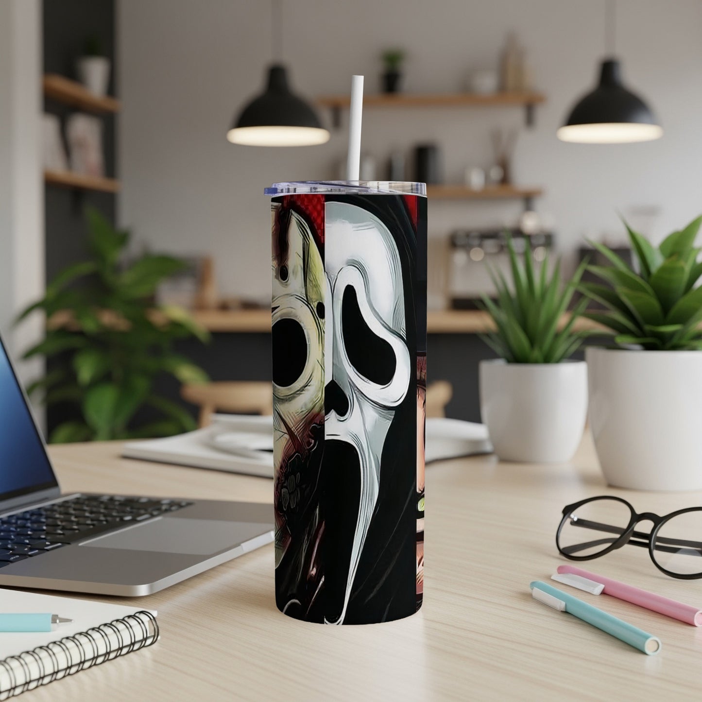 Scream mask graphic on a white stainless steel tumbler with straw.