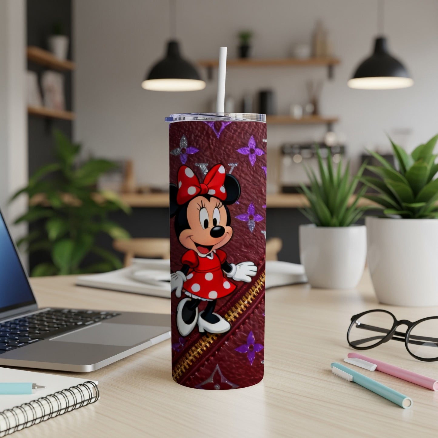 Minnie Mouse on a burgundy tumbler with a faux zipper detail and diamond pattern.