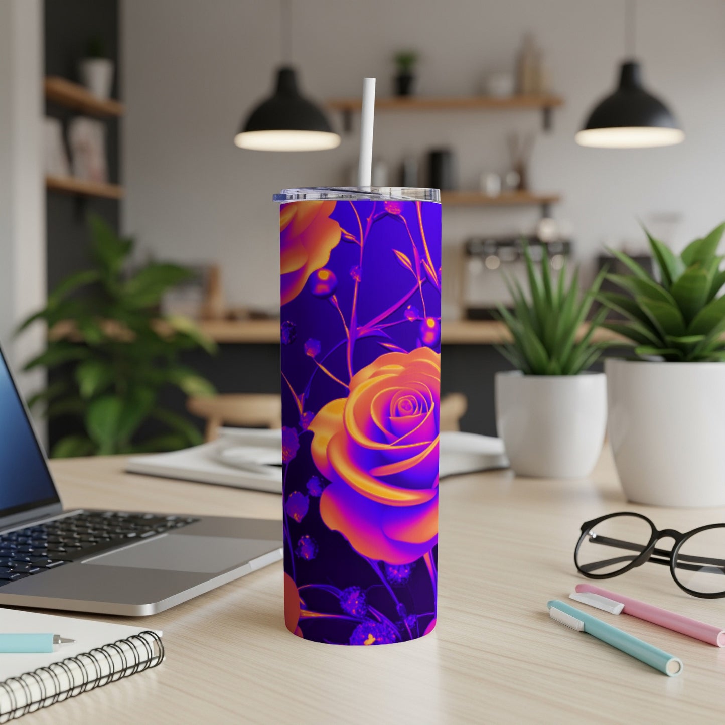 Purple tumbler with colorful rose design and white straw.