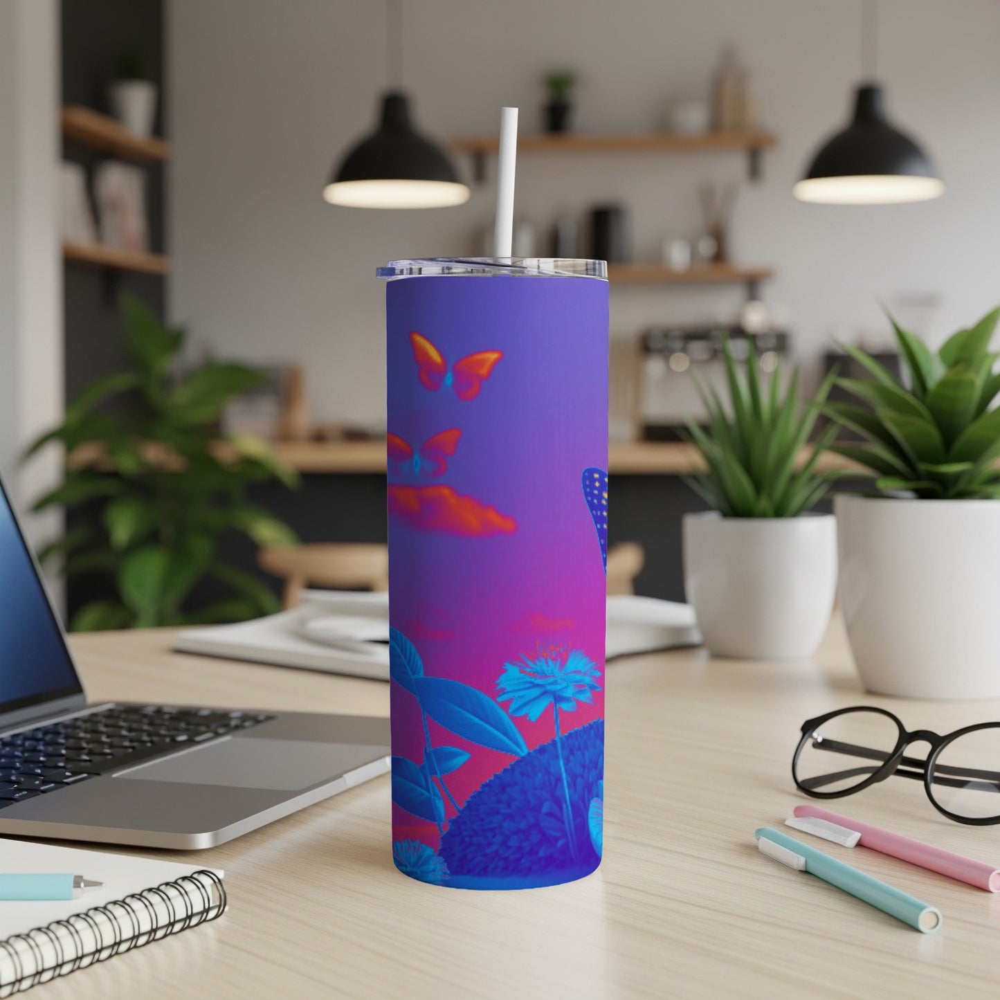 Purple butterfly tumbler with blue floral and insect design.
