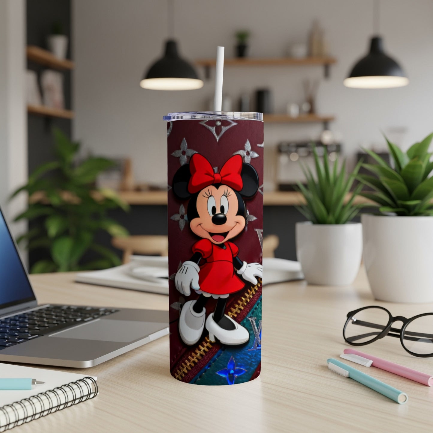 Minnie Mouse on a maroon tumbler with repeating pattern and zipper detail.