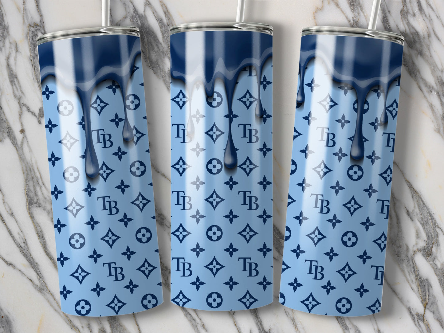 TB Logo Design In Light Blue And Navy Blue Tumblers