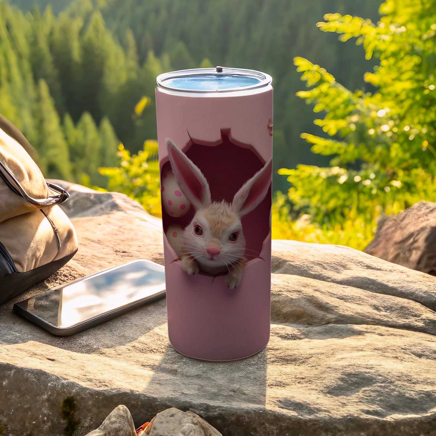 Pink tumbler with Easter bunny peeking from cracked egg design.