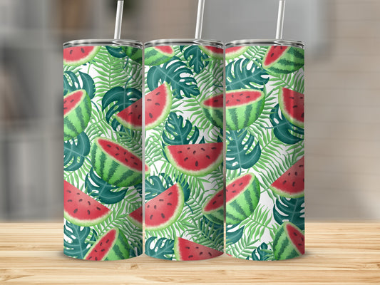 Three tumblers with a watermelon and palm leaf pattern on a wooden surface.