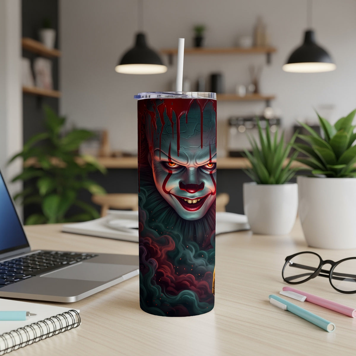 Tall tumbler with creepy clown face and dripping blood design.