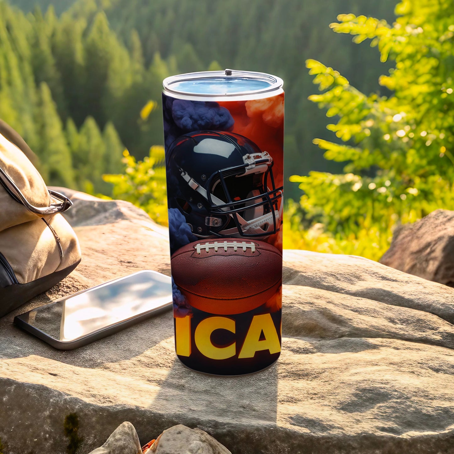 Football helmet and ball design on a tumbler with "ICA" text.