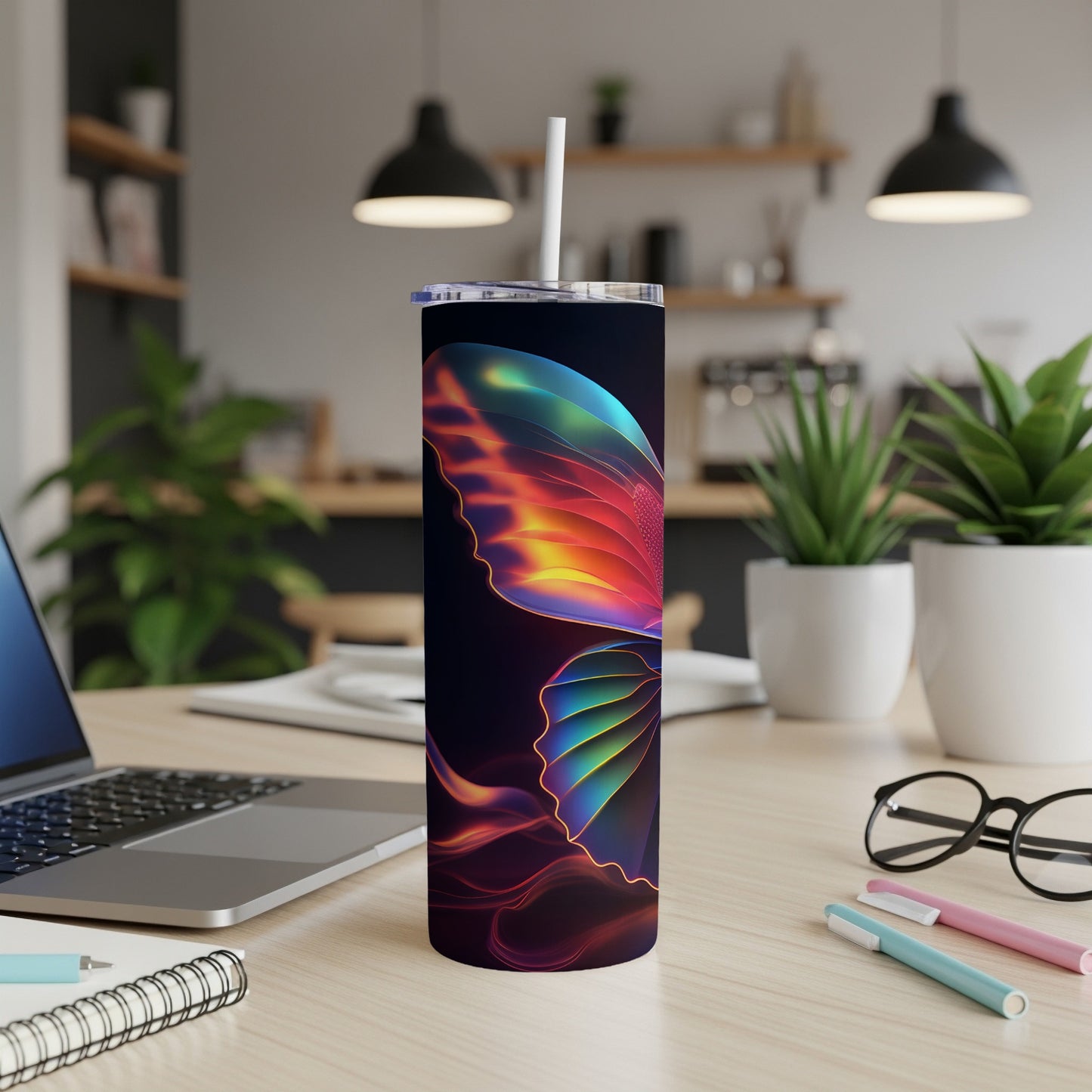 Dark tumbler with colorful iridescent butterfly wing design.